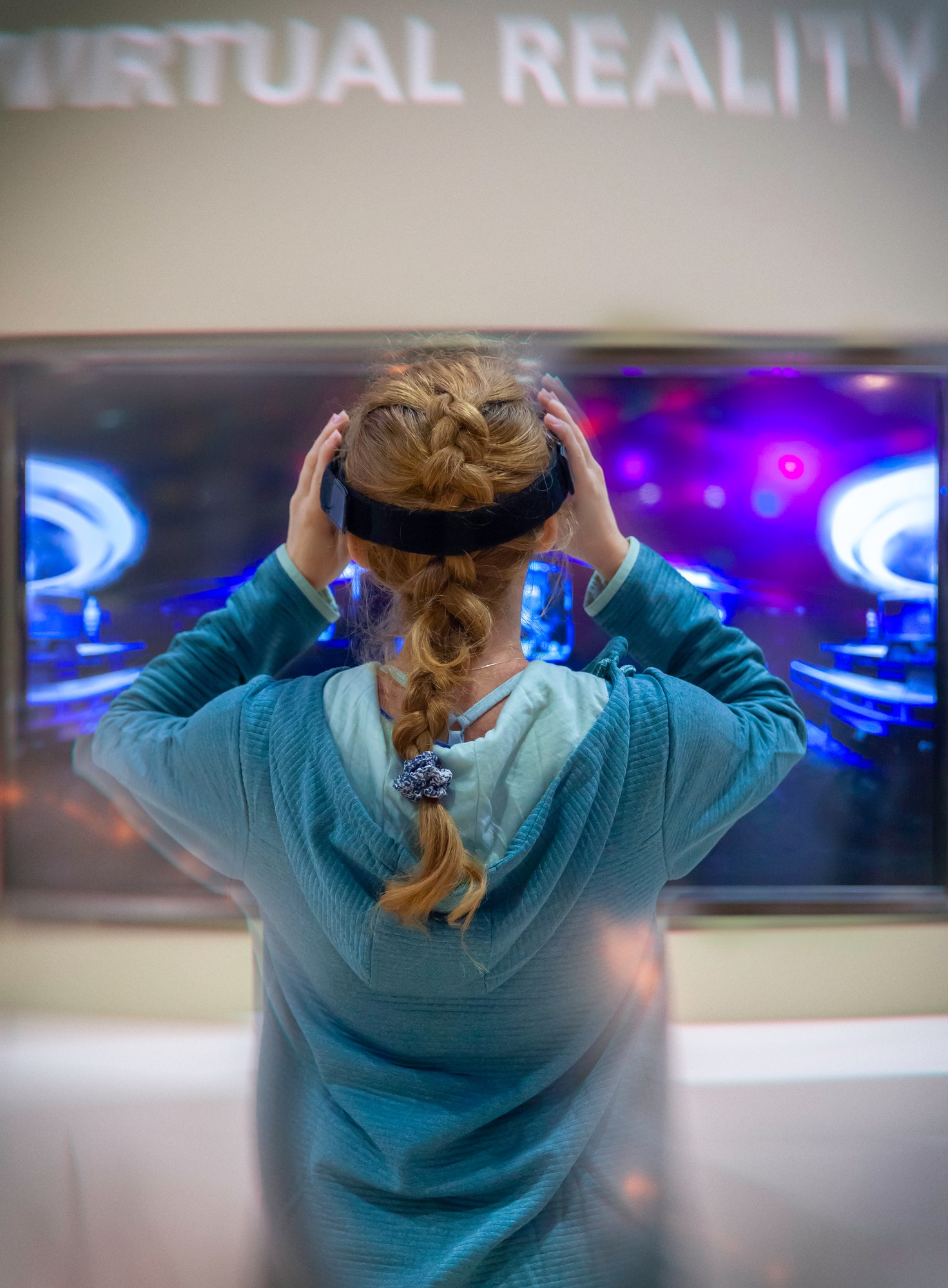 Girl stay in front of virtual reality